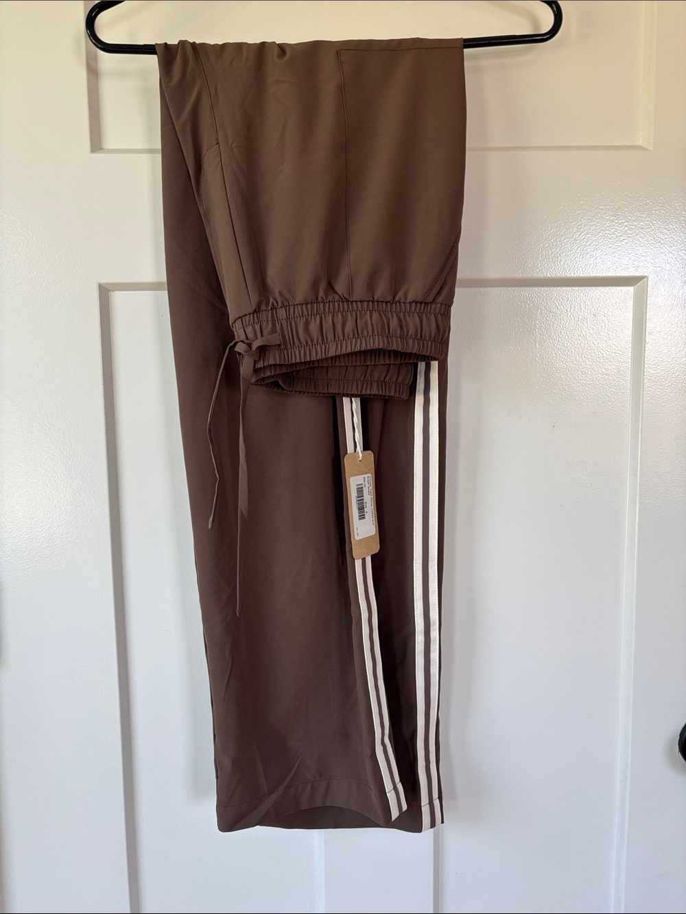 Albion track pants, brown with white stripes down side